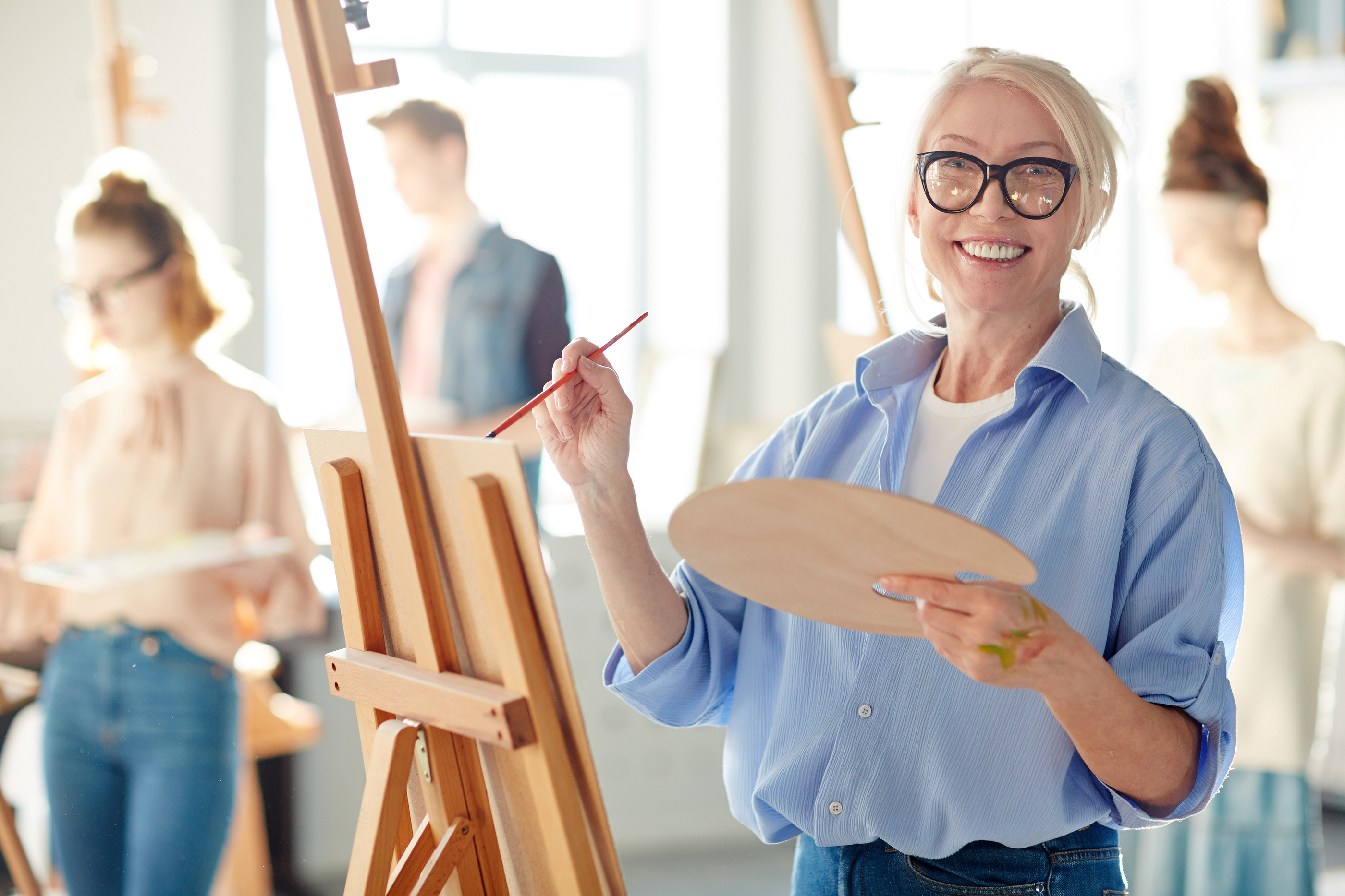 Older adult focused on a quiet creative hobby